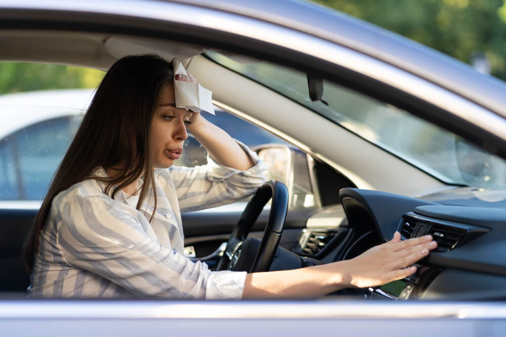 Woman Sweats in Car without AC